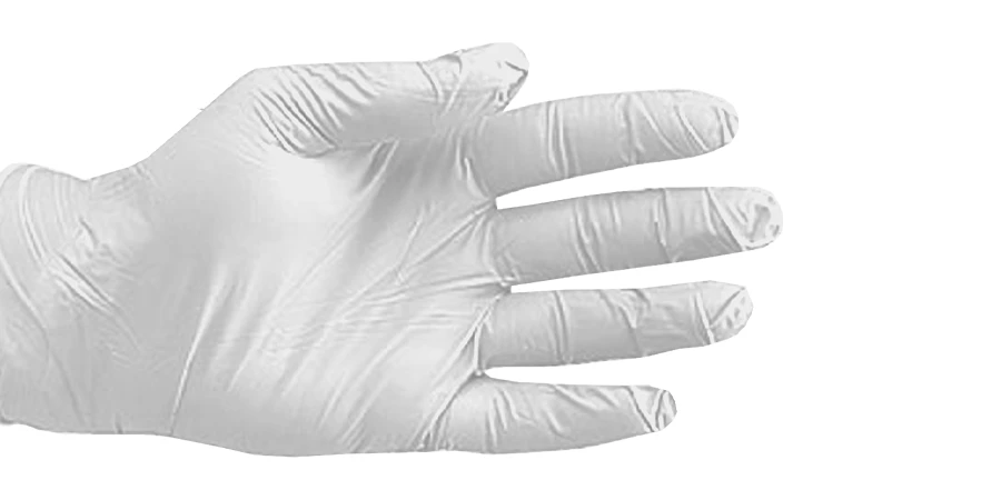 zoom sur une main portant un gant latex poudré