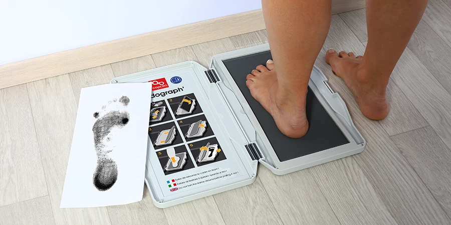 podograph 1 pied ouvert et un patient est dessus